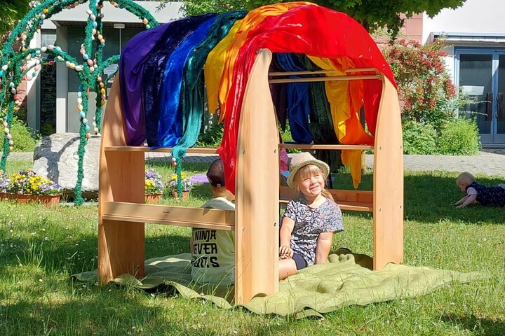 Foto: K. Reinhard Kind unter dem Regenbogen